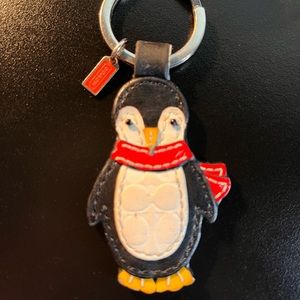 **Coach Penguin Leather Keychain**